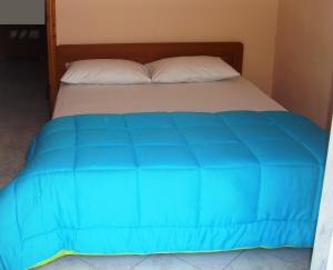 A bed or beds in a room at Zavrakli