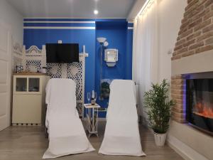 TV a/nebo společenská místnost v ubytování Santa Lucia Guest House