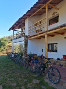 a row of bikes parked outside of a building at Villa Aventura Lodge in Cajamarca