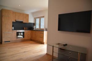 A kitchen or kitchenette at Ferienwohnung Grunholz
