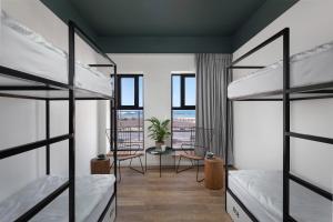 Ένα ή περισσότερα κρεβάτια σε δωμάτιο στο 180 Boutique Hostel