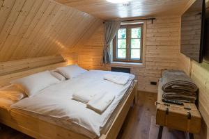 Postel nebo postele na pokoji v ubytování U Justina na potůčku