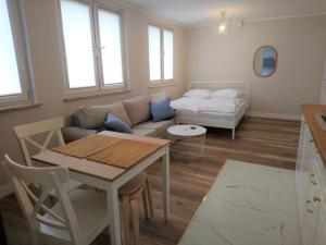 Posedenie v ubytovaní Nowe Apartamenty na Gryfa