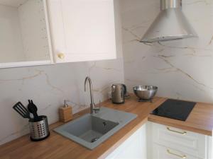 Kuchyňa alebo kuchynka v ubytovaní Nowe Apartamenty na Gryfa