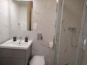 Kúpeľňa v ubytovaní Nowe Apartamenty na Gryfa
