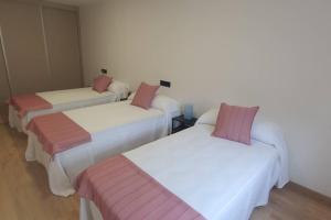 Postel nebo postele na pokoji v ubytování Duplex con terraza