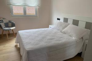 Postel nebo postele na pokoji v ubytování Duplex con terraza