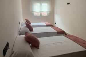 Postel nebo postele na pokoji v ubytování Duplex con terraza