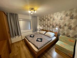 Posteľ alebo postele v izbe v ubytovaní High Tatras apartment with an amazing view