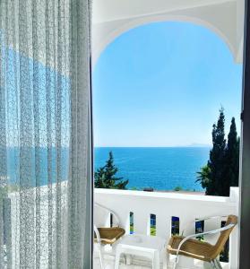 a room with a view of the ocean at Royal City Hotel in Antalya