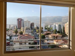 a view of a city from a window at IDEAL ESPECIAL FAMILIAR in Cochabamba