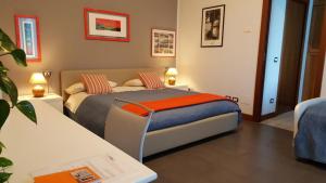Postel nebo postele na pokoji v ubytování B&B Margè
