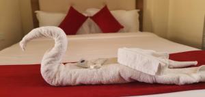 Walabi Mara Hotel客房内的一张或多张床位