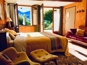 Postel nebo postele na pokoji v ubytování Chambre d'Hôtes La Grange des Ecrins + 37 fotografií