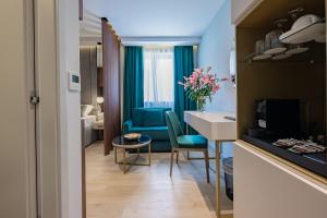 Posedenie v ubytovaní Caldo Luxury Rooms
