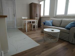 Posedenie v ubytovaní Nowe Apartamenty na Gryfa