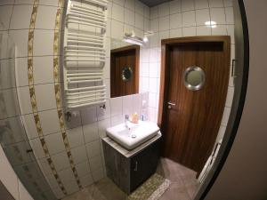 Kúpeľňa v ubytovaní Apartament Osiedle Garnizon + 37 fotografií