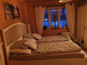 Postel nebo postele na pokoji v ubytování Chalet-Beskydy