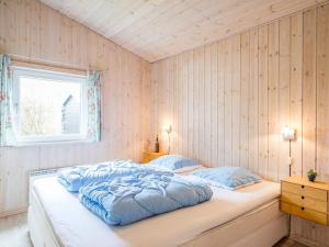 Postel nebo postele na pokoji v ubytování Holiday home Tarm XLV
