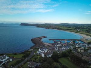 an aerial view of a small town next to a body of water at The Clara, Ballycastle in Ballycastle