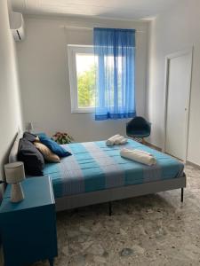 Postel nebo postele na pokoji v ubytování Cutapp Guest House