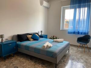 Postel nebo postele na pokoji v ubytování Cutapp Guest House