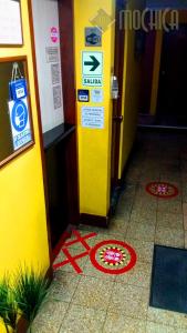 Certificato, attestato, insegna o altro documento esposto da Hostal Residencial Mochica