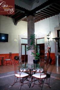 En restaurant eller et andet spisested på Casa de los Dulces Sueños