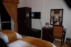 Letto o letti in una camera di Diwan Al Amir