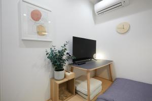 TV a/nebo společenská místnost v ubytování Designers Hotel Siesta