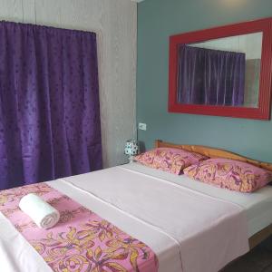 Ένα ή περισσότερα κρεβάτια σε δωμάτιο στο Raihei Location maison d'hôtes