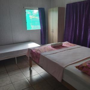 Postel nebo postele na pokoji v ubytování Raihei Location maison d'hôtes
