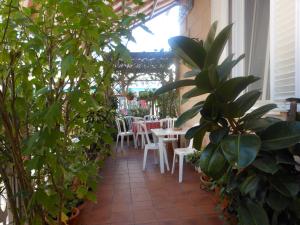 Um restaurante ou outro lugar para comer em Hotel Fiammetta