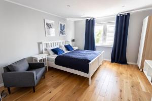 Postel nebo postele na pokoji v ubytování Apartamenty Trzy Rybki