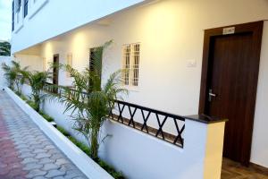 Balkón nebo terasa v ubytování THAAI RESIDENCY