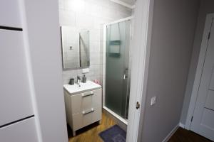 Ванна кімната в Apartments OCHERET