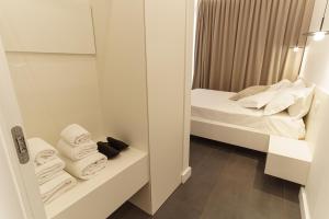 Postel nebo postele na pokoji v ubytování B&B Nel Blu Dipinto Di Blu