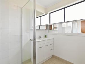a bathroom with a sink and a shower at Muirfield Beach Unit 1-23 in Torquay