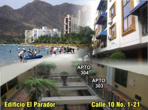 a picture of a beach with people in the water at Acogedor apartamento a 15 metros del mar in Santa Marta