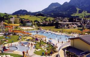 a group of people at a water park at Ferienwohnung Rettenegger in Abtenau