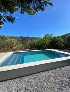 Der Swimmingpool an oder in der Nähe von La cara Luna