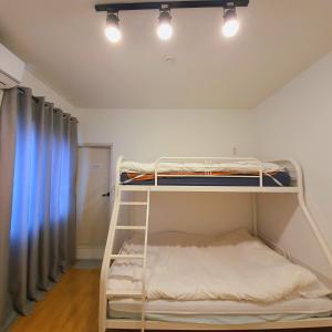 Postel nebo postele na pokoji v ubytování Hannahstay Women Only Guesthouse