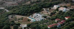 an aerial view of a large house in a forest at K Villas in Plataria