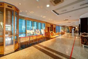 a large room with a lot of windows at Izmailovo Alfa Hotel in Moscow