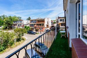 a balcony with a view of a street at Hostel Premium & Apartments Kołobrzeg in Kołobrzeg