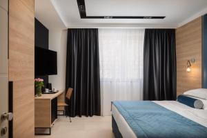 Postel nebo postele na pokoji v ubytování Luxury rooms Unicus I, II, IV