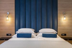 Postel nebo postele na pokoji v ubytování Luxury rooms Unicus I, II, IV