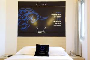 Een bed of bedden in een kamer bij Zodiak Paskal by KAGUM Hotels