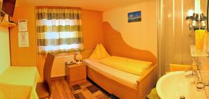 Postel nebo postele na pokoji v ubytování Haus Waldheim