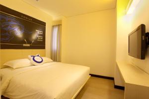 Een TV en/of entertainmentcenter bij Zodiak Paskal by KAGUM Hotels
